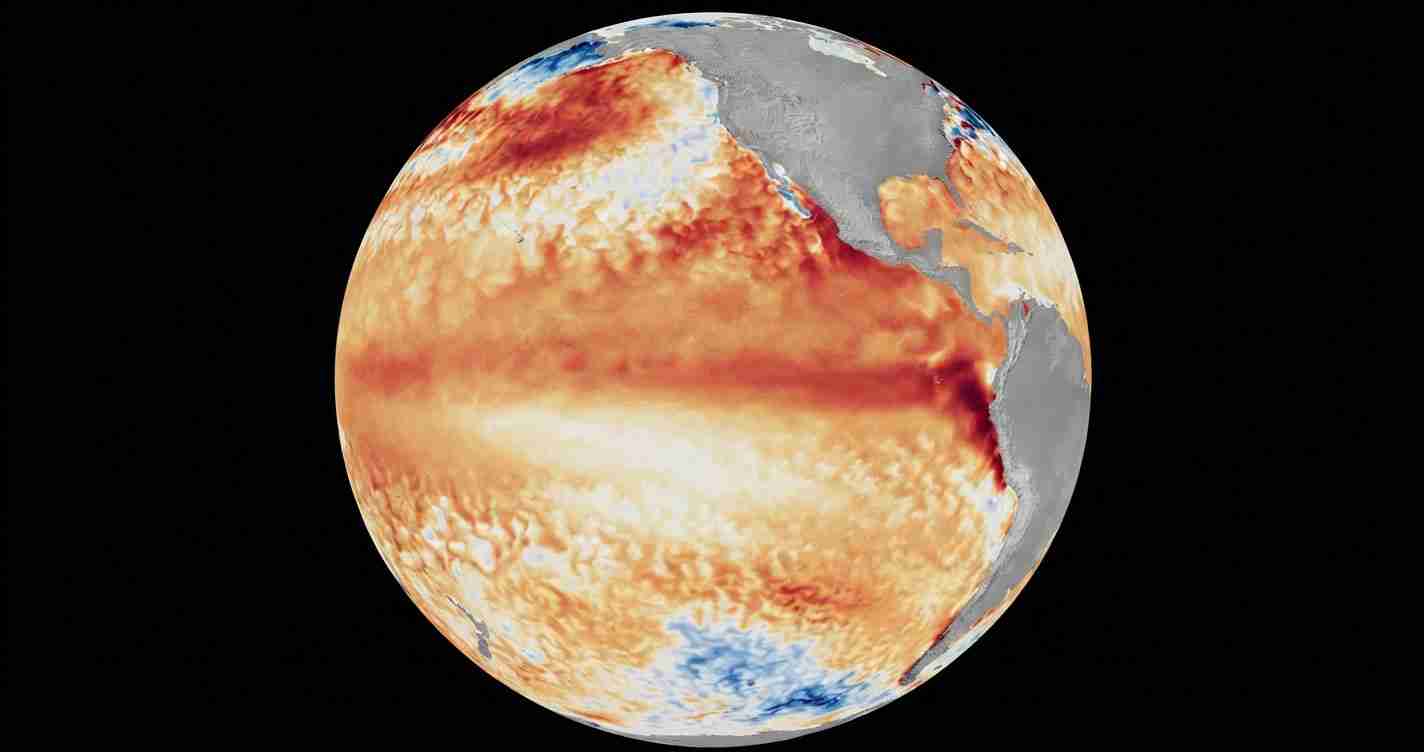 Color-enhanced view of Earth showing warm sea-surface temperatures across the oceans, with landmasses in gray against a black background.